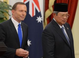 TONY ABBOT AND SUSILO BAMBANG YUDHOYONO. "In response, Dr Yudhoyono and his government demanded a full explanation and suspended many areas of government-to-government co-operation, including help in tackling people-smuggling. The decision to monitor the first lady, known in Indonesia as Ibu Ani, has been the most controversial part of the spy scandal." (abc.net) 